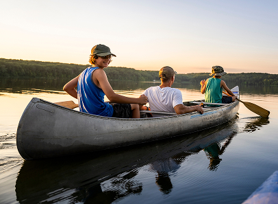 Three people in a canoe