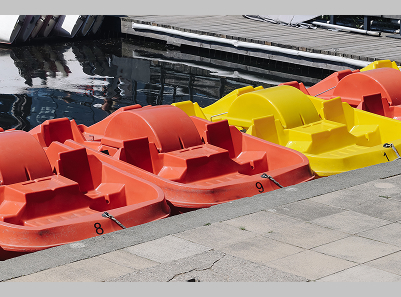 Three docked paddleboats