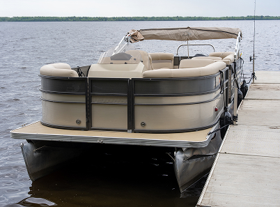 docked pontoon boat